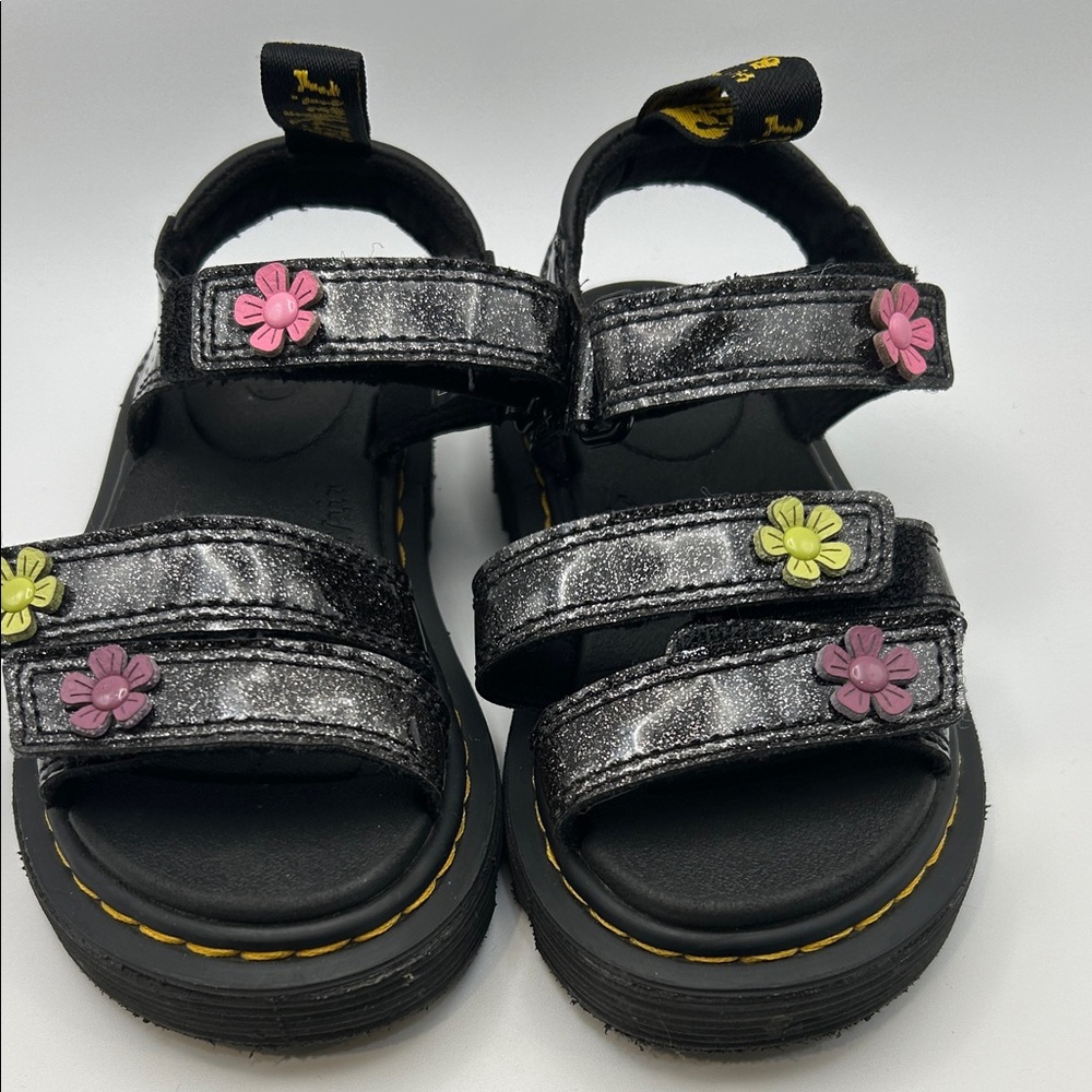 Dr. Martens Kids Black Glitter Sandals with Pink and Yellow Flower Accents